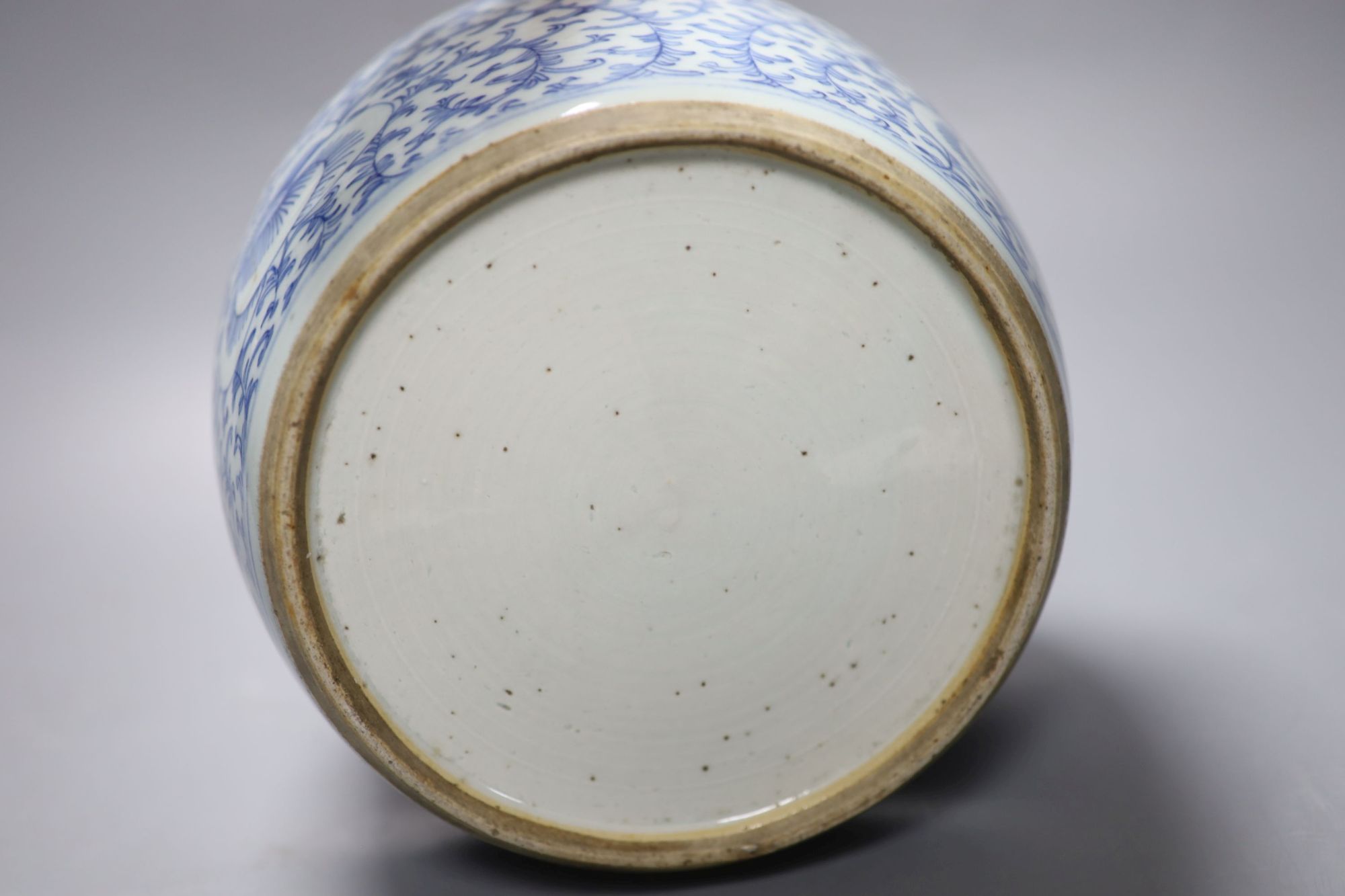 A 19th century Chinese blue and white jar, with associated cover, height 22cm